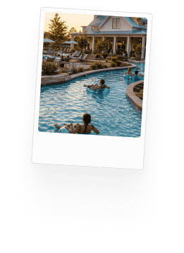 Community pool with people swimming in Fika in Elgin, TX.