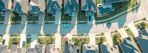 Aerial view of Fika community homes and streets in Elgin, TX.