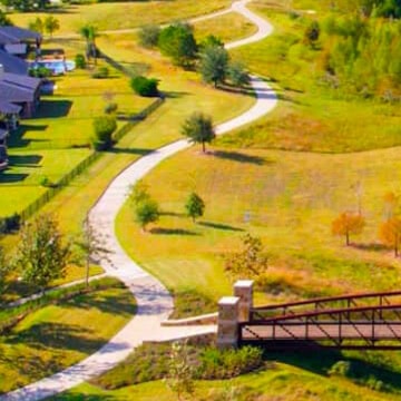 Curving walking trail in Fika community in Elgin, TX.